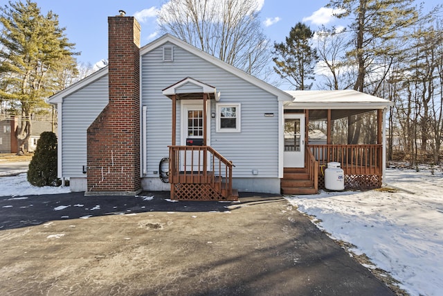 view of front of property featuring a sunroom