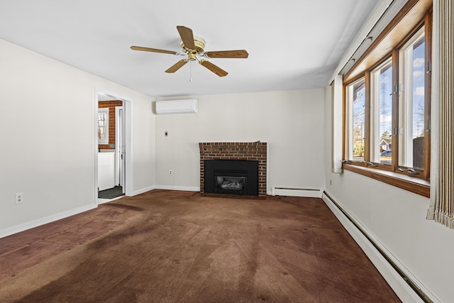 unfurnished living room featuring an AC wall unit, baseboard heating, dark colored carpet, ceiling fan, and a brick fireplace