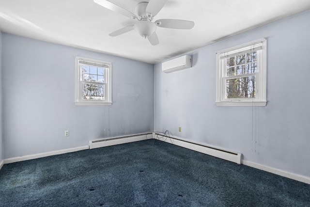 spare room with ceiling fan, a baseboard heating unit, carpet flooring, and a wall mounted air conditioner