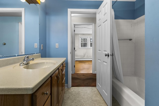 bathroom featuring vanity, baseboard heating, tile patterned floors, and shower / tub combo with curtain