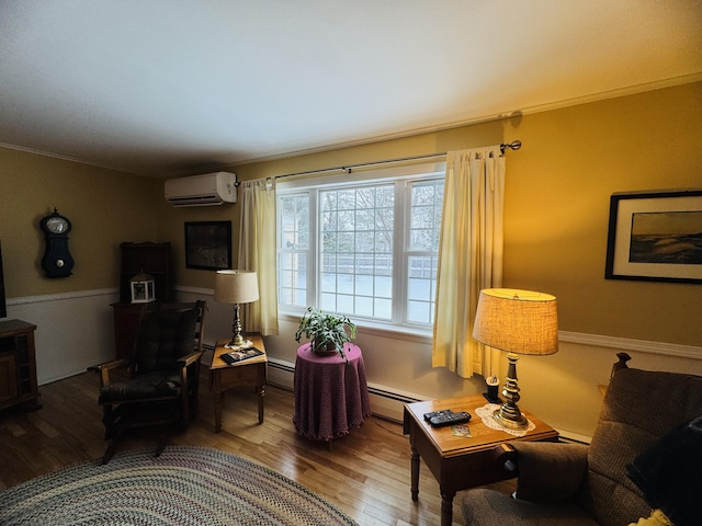 living room featuring baseboard heating, a wall mounted AC, and light wood-type flooring