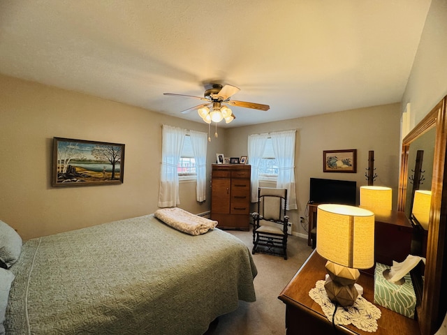 bedroom with carpet floors and ceiling fan