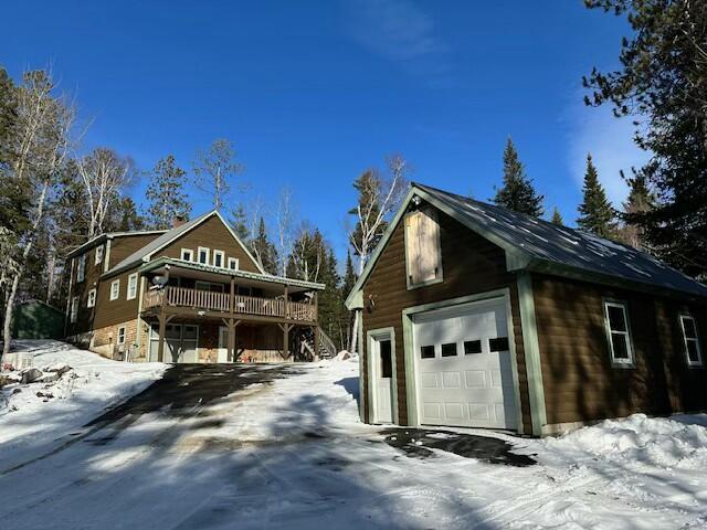 view of front of property with a wooden deck