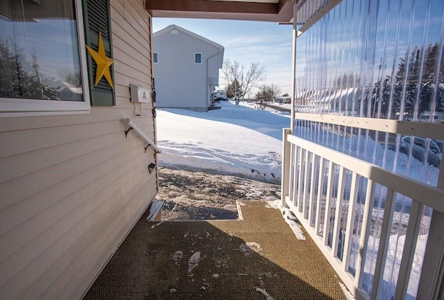 view of snow covered patio