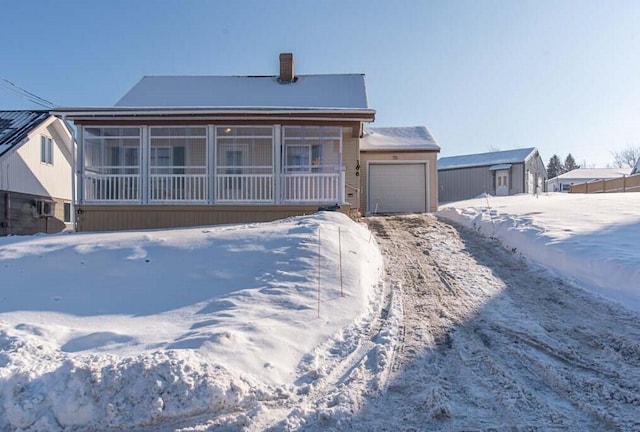 single story home with a garage