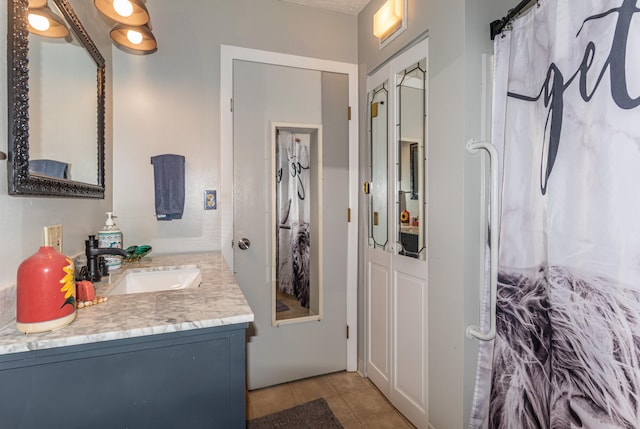 186 Mountain View Ave, Madawaska, ME 04756 - bathroom with vanity and tile patterned floors