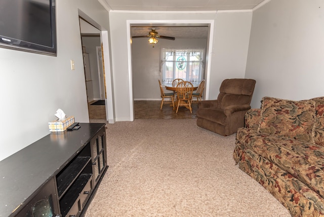 186 Mountain View Ave, Madawaska, ME 04756 - living room with light colored carpet, crown molding, a ceiling fan, and baseboards