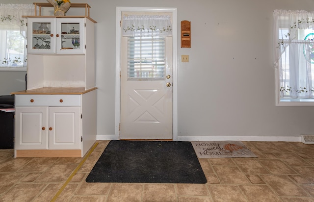 186 Mountain View Ave, Madawaska, ME 04756 - entryway featuring baseboards