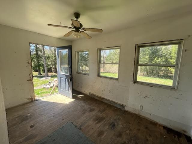 98 White Schoolhouse Rd, Corinth, ME 04427 - interior space with ceiling fan and wood finished floors