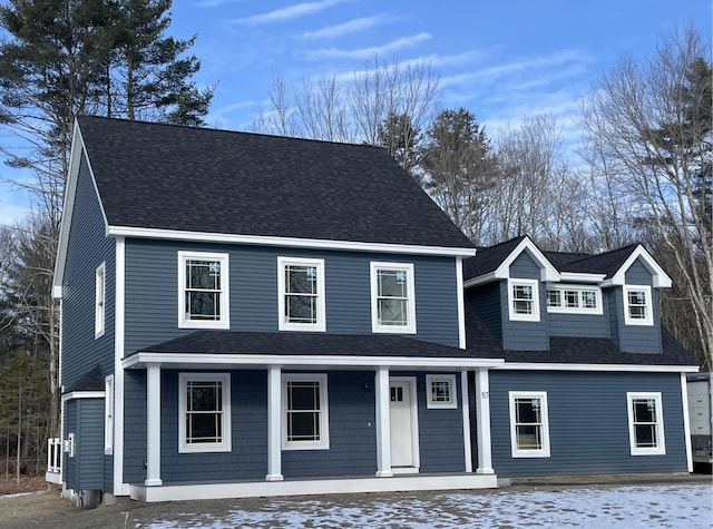 view of property featuring covered porch