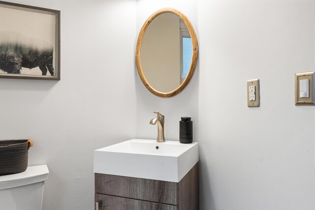 16 Hayden Hill Rd, Litchfield, ME 04350 - half bathroom featuring toilet and vanity
