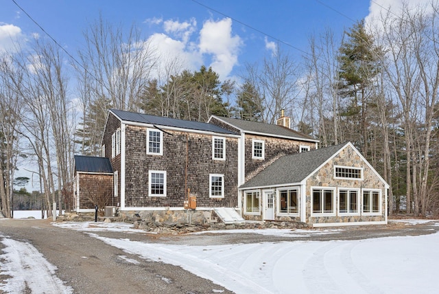 view of front of home featuring central AC