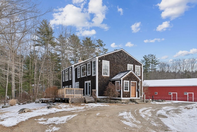 view of front of home with a deck