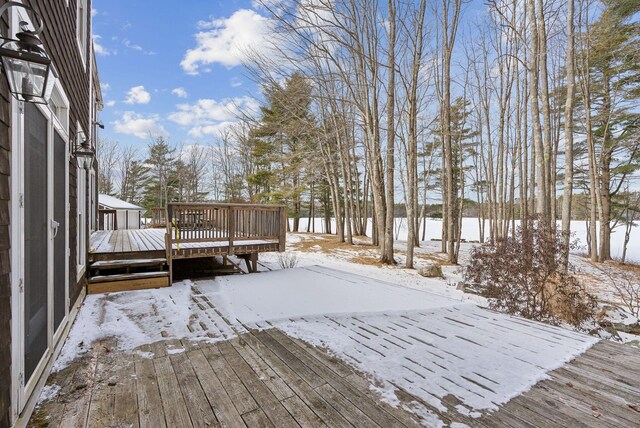 view of snow covered deck