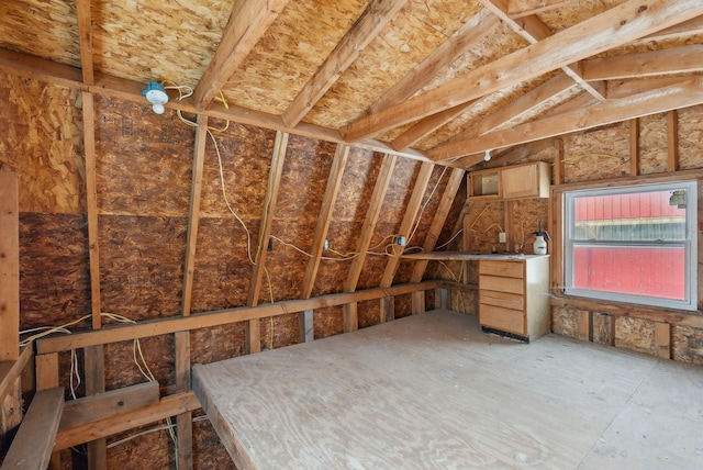 interior space with vaulted ceiling