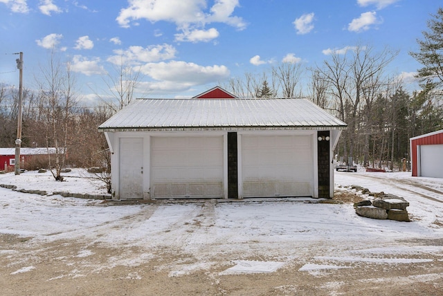 view of snow covered garage