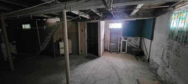 basement with washing machine and dryer