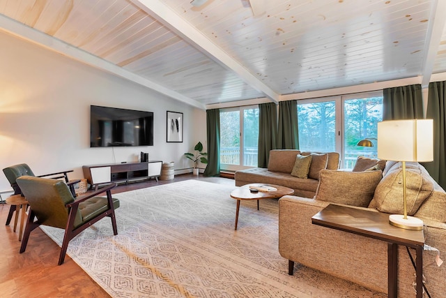 living room featuring wood-type flooring, a baseboard heating unit, and vaulted ceiling with beams