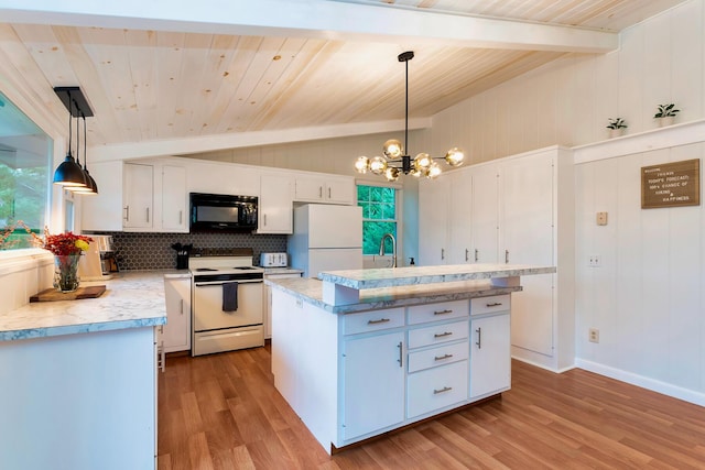 kitchen with decorative light fixtures, white cabinets, white appliances, and a kitchen island