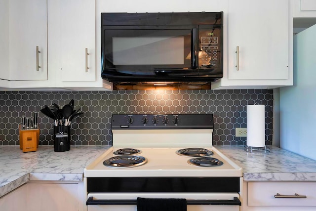 kitchen featuring white cabinetry, range with electric stovetop, and backsplash