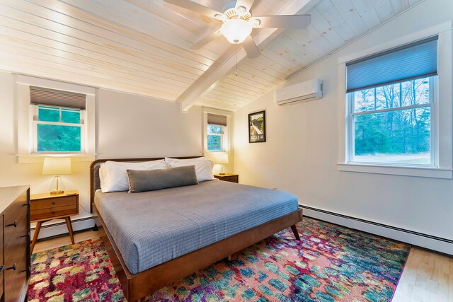 bedroom featuring ceiling fan, hardwood / wood-style floors, vaulted ceiling with beams, a wall mounted air conditioner, and a baseboard radiator