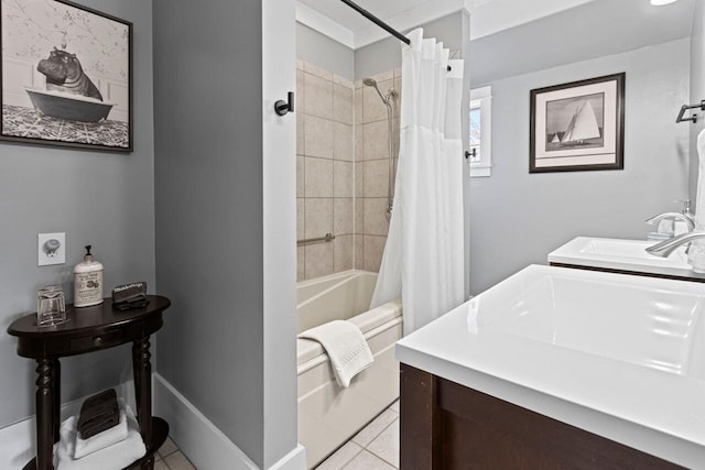 bathroom with shower / bath combo with shower curtain, tile patterned floors, and vanity