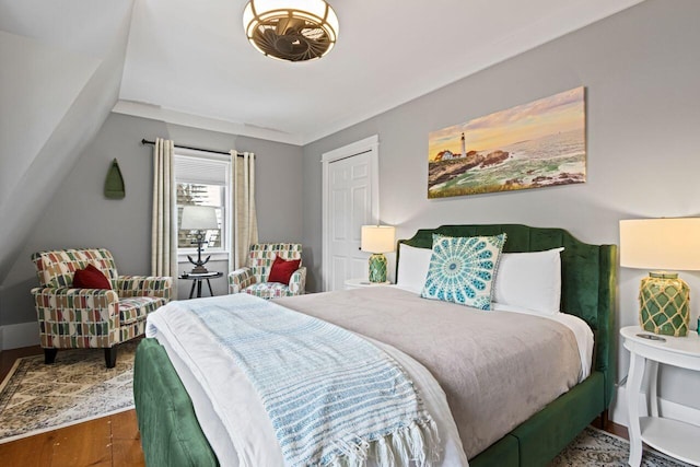 bedroom featuring dark hardwood / wood-style flooring