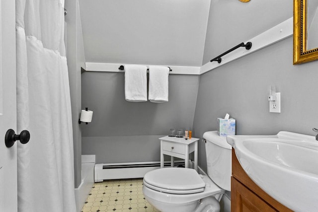 bathroom with vanity, a shower with curtain, toilet, and baseboard heating