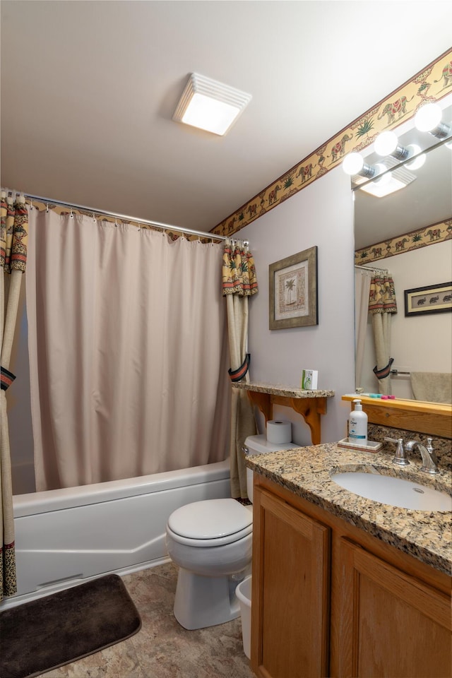 full bathroom with toilet, vanity, and shower / bath combo