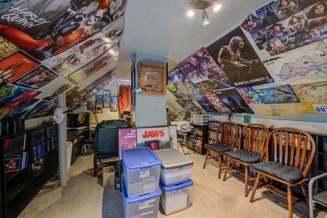 interior space with vaulted ceiling and carpet