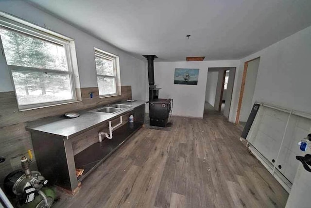 living room featuring wood-type flooring and sink