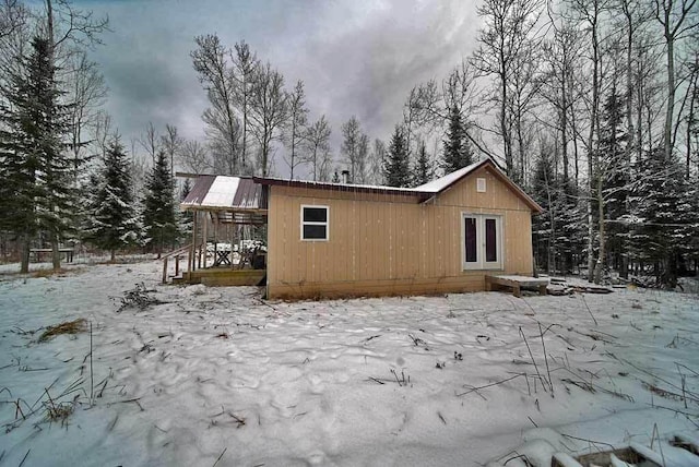 view of snow covered property