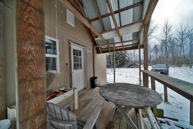 view of snow covered deck