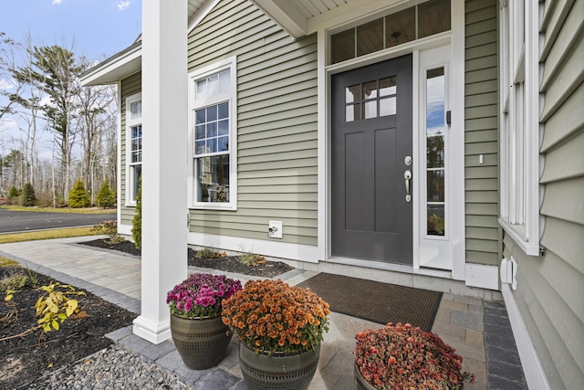 entrance to property with a porch