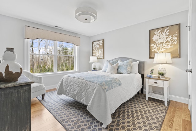 bedroom featuring hardwood / wood-style flooring