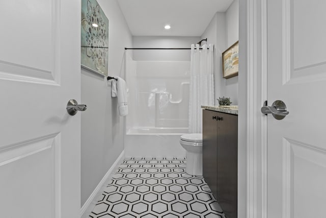 full bathroom featuring toilet, vanity, and shower / bath combo