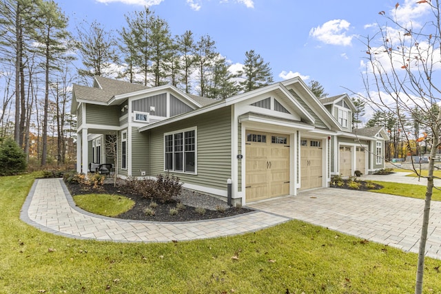 view of home's exterior featuring a yard and a garage