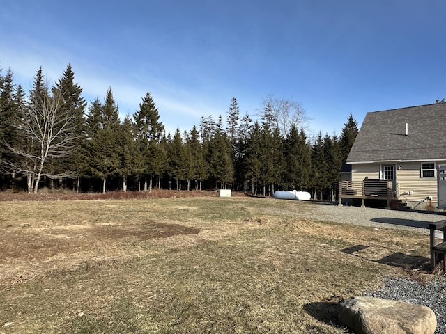 view of yard with a deck