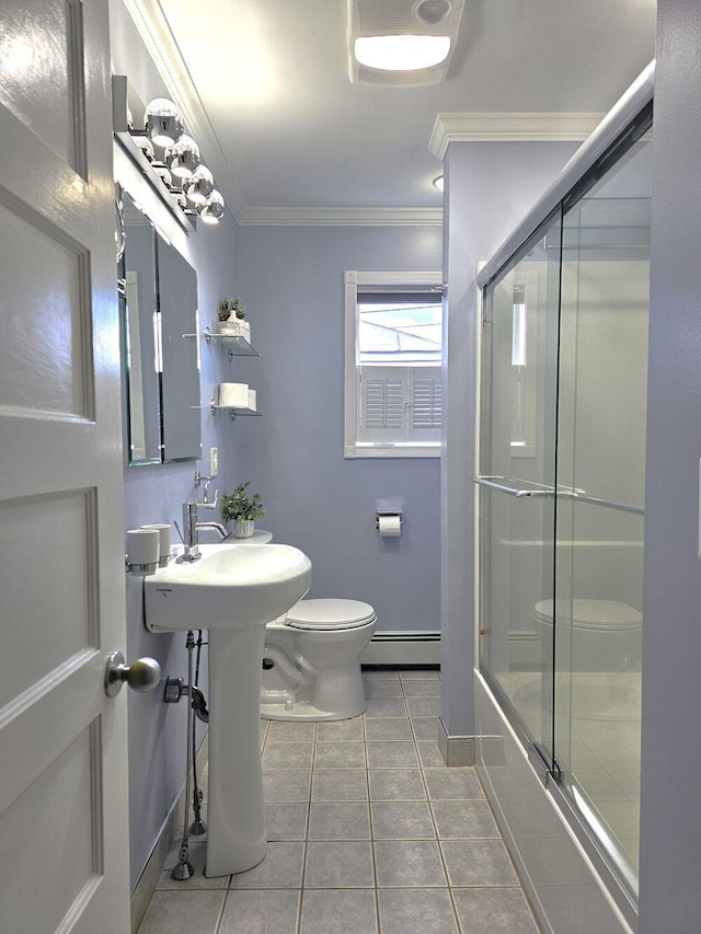 bathroom with baseboard heating, enclosed tub / shower combo, ornamental molding, and tile patterned flooring