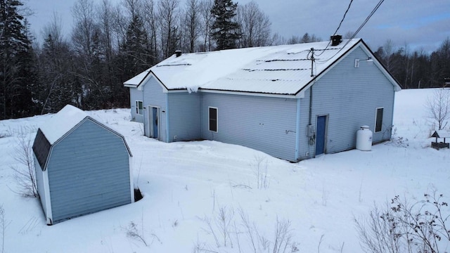 view of snow covered property