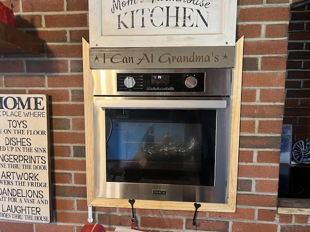 room details featuring stainless steel oven