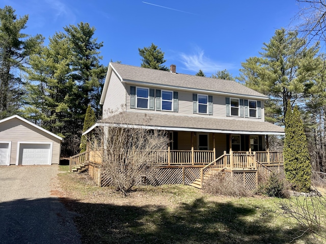 8 Pine Hill Dr, Belfast, ME 04915 - farmhouse-style home with stairway, a chimney, an outdoor structure, a porch, and a garage
