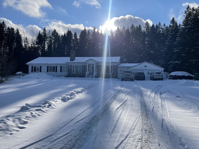 single story home featuring a garage