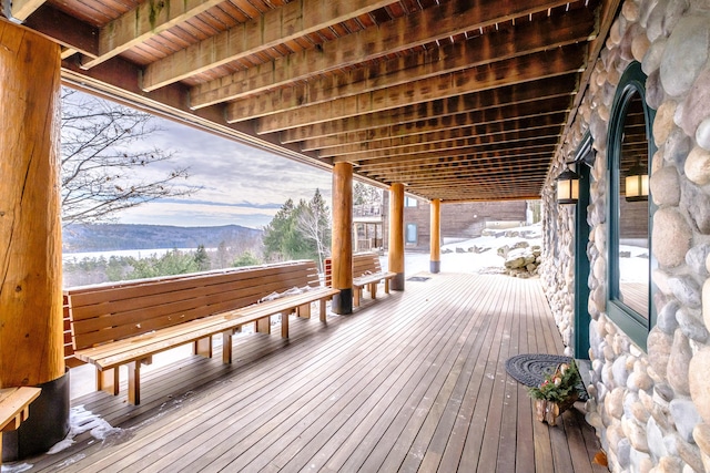 wooden terrace featuring a mountain view