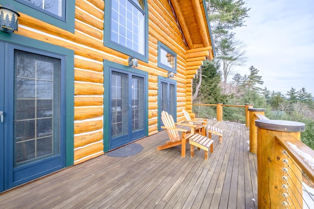 wooden terrace featuring french doors