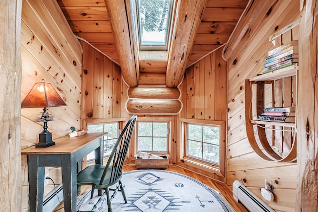 office area featuring a baseboard heating unit, rustic walls, hardwood / wood-style flooring, a skylight, and wood ceiling