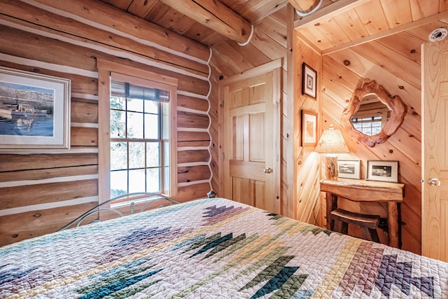 bedroom with beam ceiling, wooden ceiling, and log walls