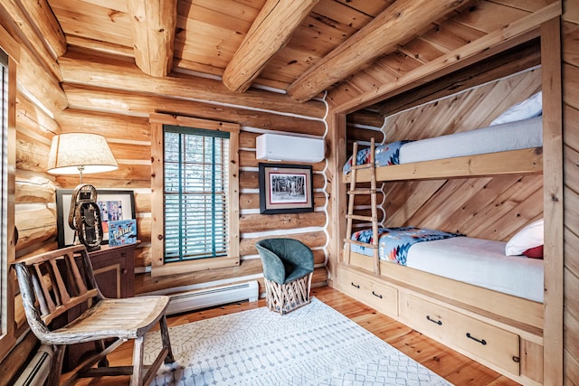 bedroom featuring an AC wall unit, hardwood / wood-style floors, rustic walls, and beamed ceiling