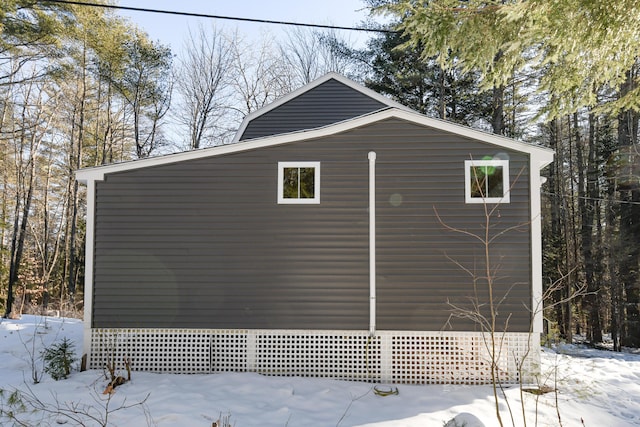 view of snow covered property