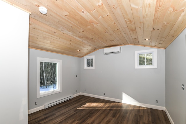 additional living space with lofted ceiling, dark wood-type flooring, a wall mounted air conditioner, a baseboard radiator, and wooden ceiling